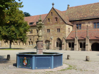 Courtyard fountain and cloister.