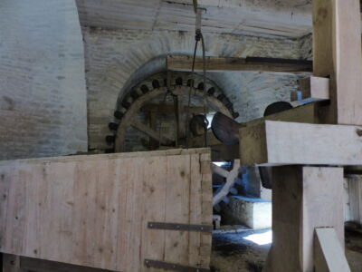 Waterwheel driven bellows for furnace.