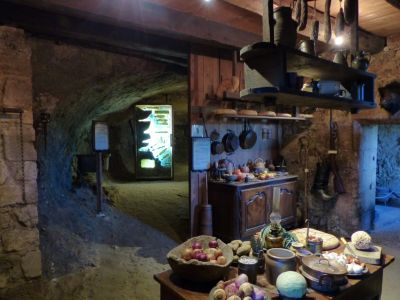 Cave storage behind kitchen