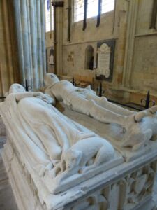 Unusual, knight & lady holding hands.